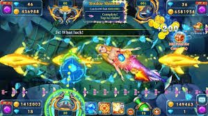 Filipino player aiming cannon at fish targets in an online fish shooting game